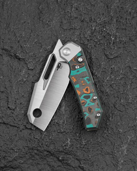BESTECH NYRRDREKI BT2607C Titanium with Shipwreck Camo Carbon Inlays Handle: 3.08" M390 Blade, Thumb Hole, Front Flipper with Button Bolster Lock, Hollow Grind